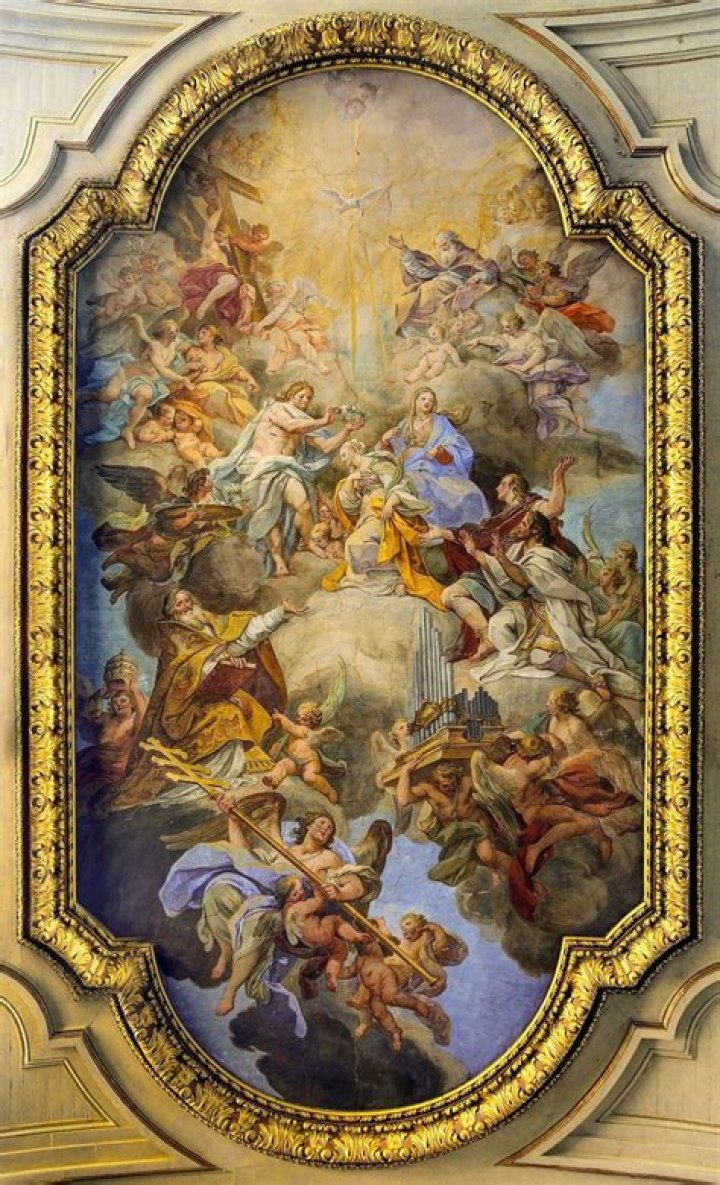 an ornate painting on the wall of a building
