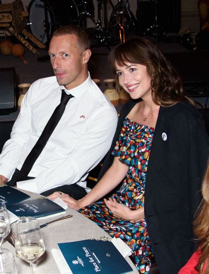 Chris Martin and Dakota Johnson are so in love, as Coldplay singer