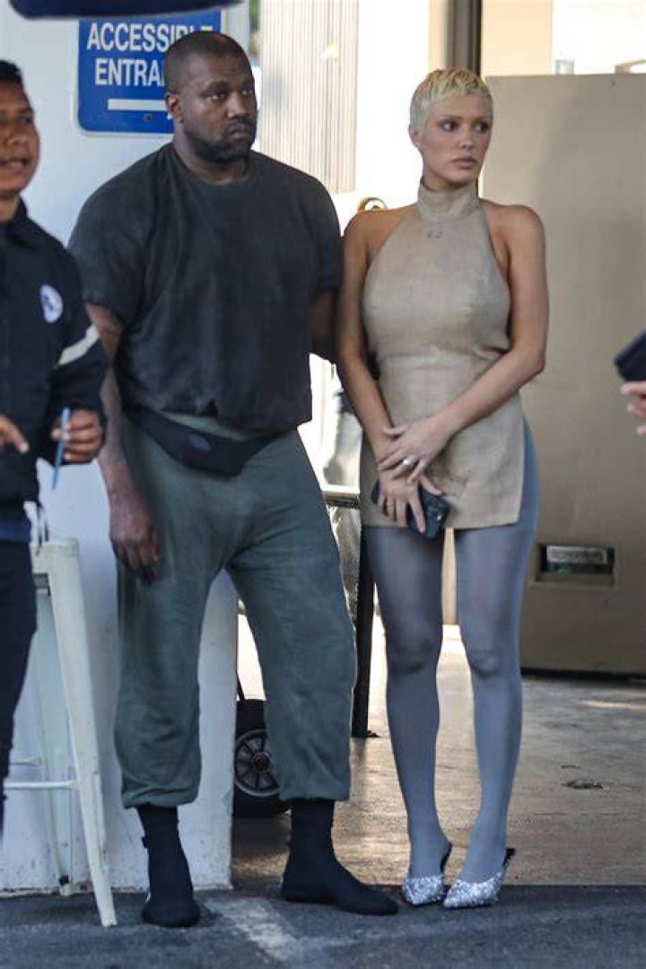 Kanye West squeezes wife Bianca Censori's butt and buries his head in