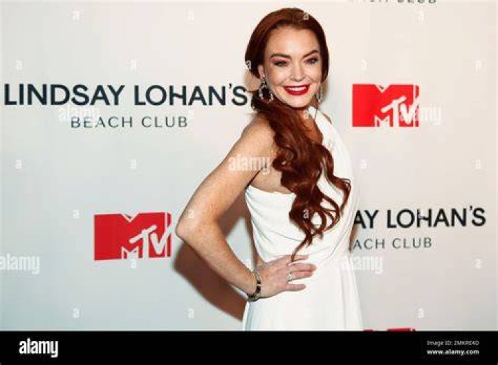 LINDSAY LOHAN Arrives at Magic Hour Rooftop Party in New York 01/07