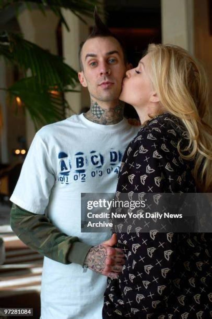 Shanna Moakler Kissing her boyfriend Matthew Rondeau at LAX GotCeleb