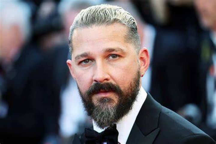 Shia LaBeouf looks excited as he runs on release day for his new movie