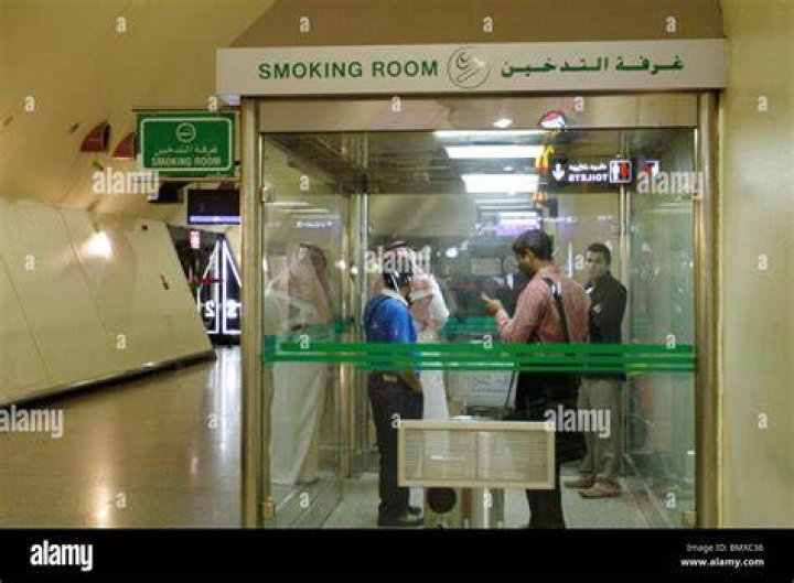 Smoking room at Kuwait Airport Stock Photo Alamy